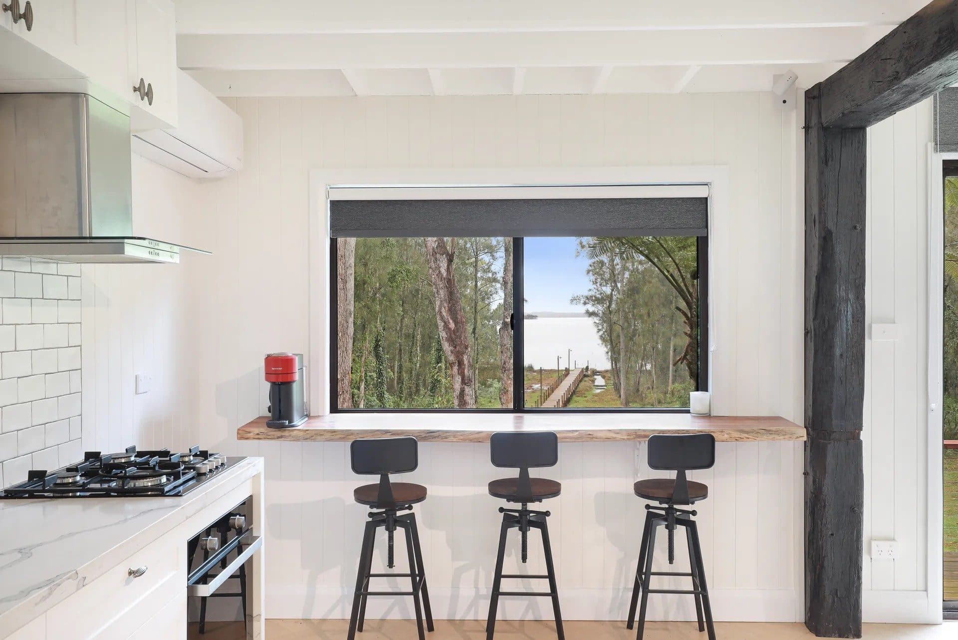 Kitchen bar at The Treehouse, Serenity 222, with treetop window views