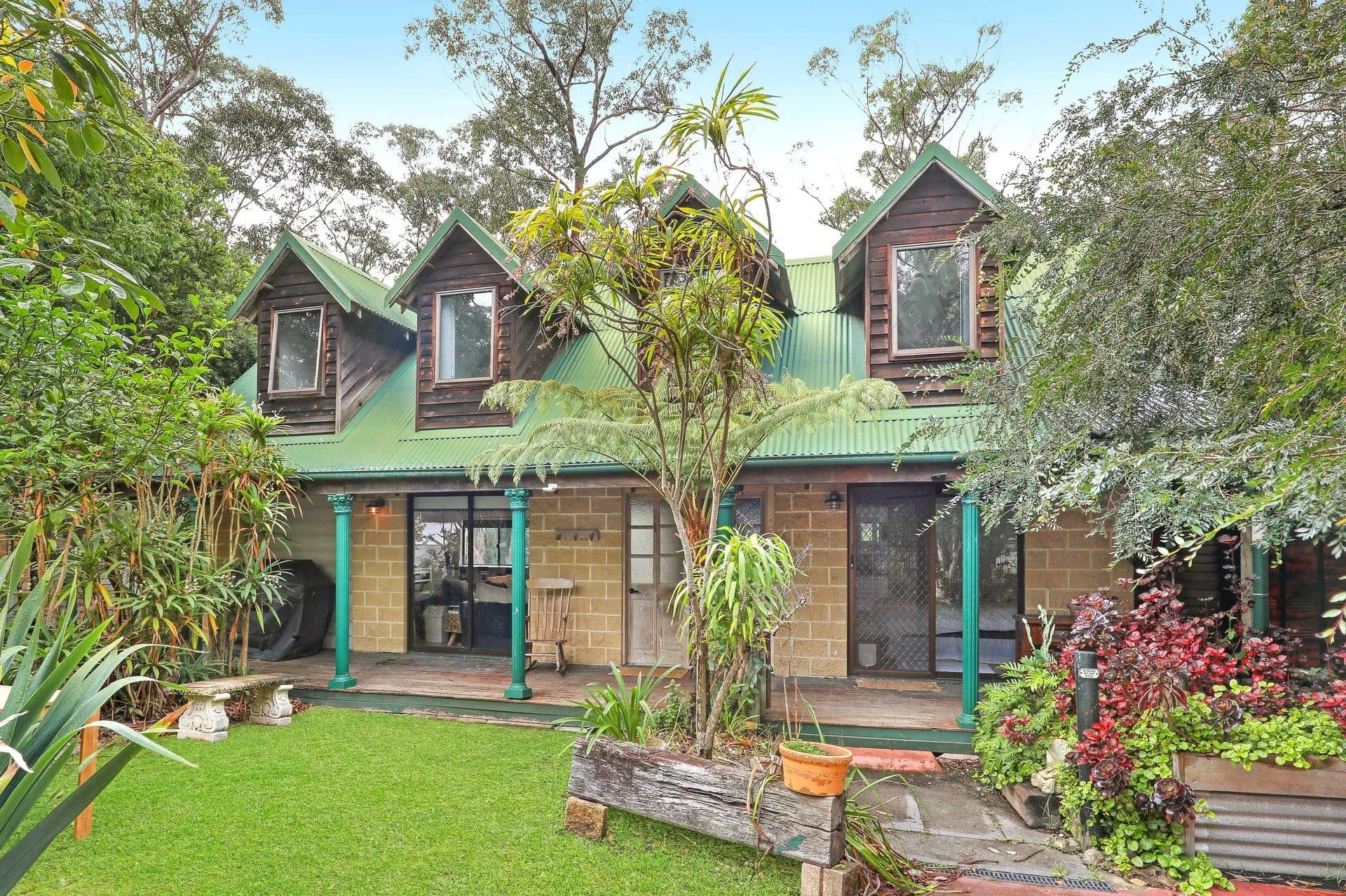 The Treehouse at Serenity 222, elevated among the gum tree canopy above St Georges Basin