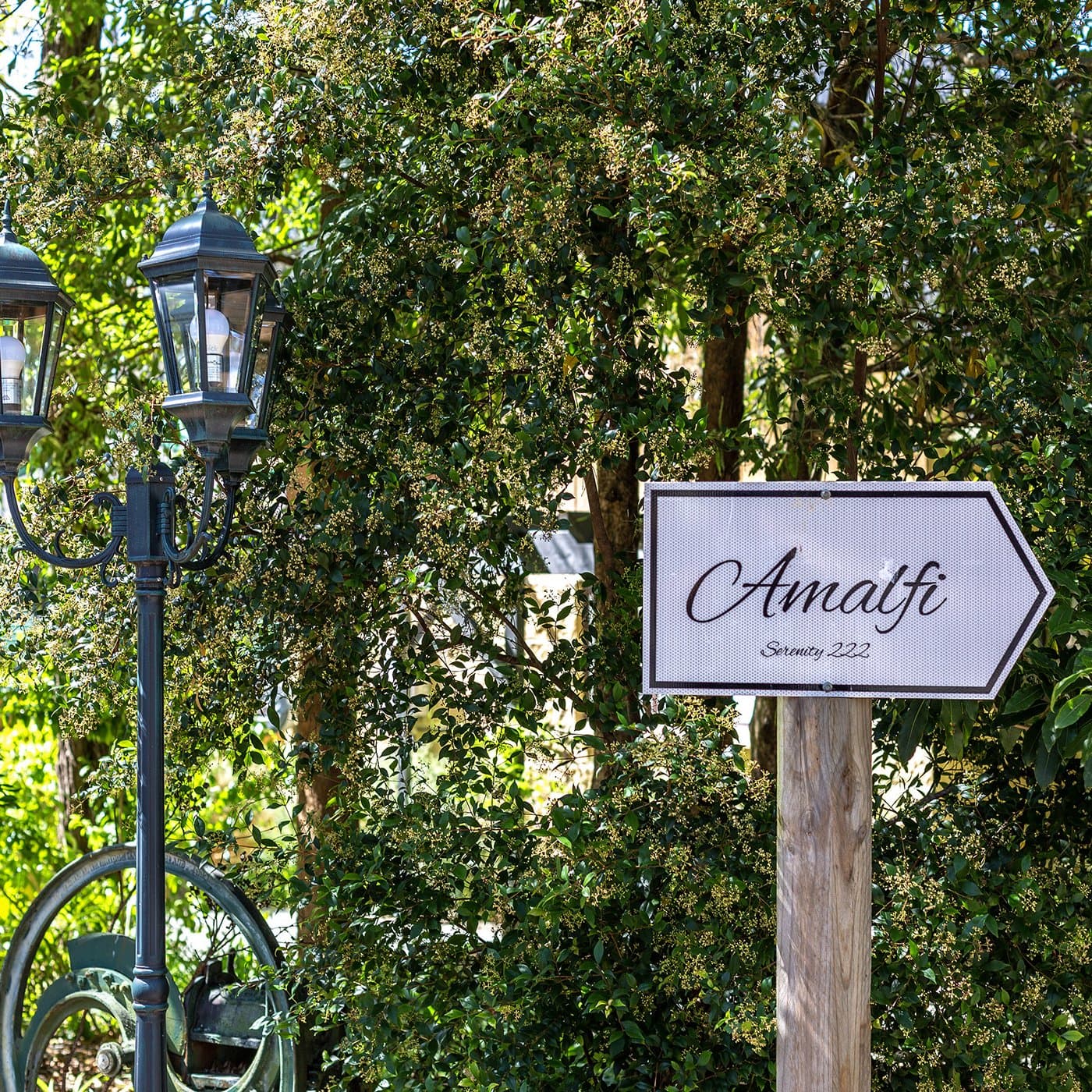 The garden sign at Amalfi, Serenity 222, among the gum trees